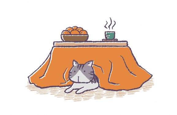 こたつに入る猫
